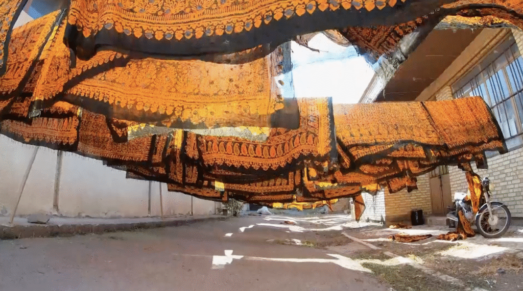 Batik print documentary, fabric drying outdoors