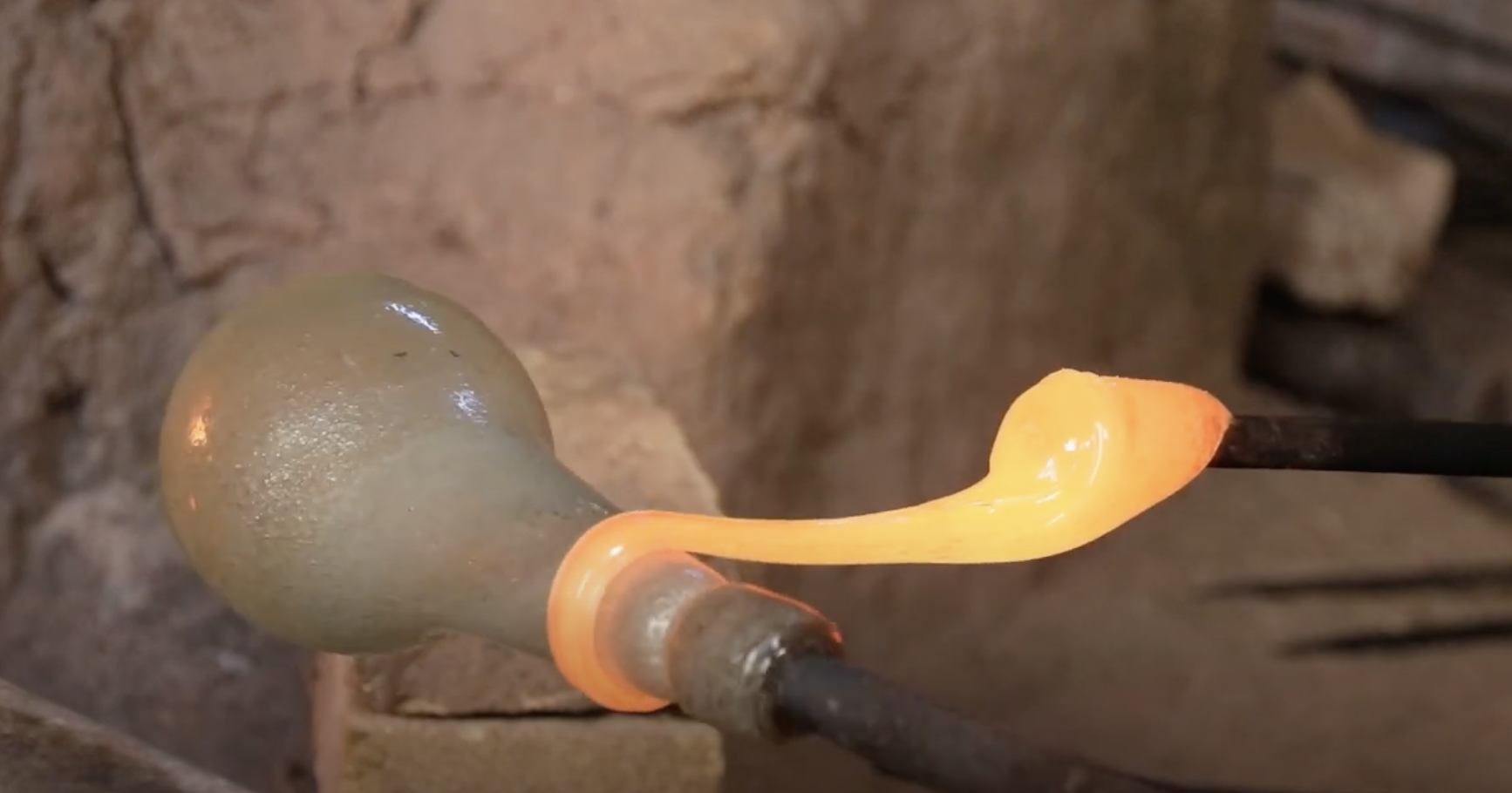 Herat glassblowing at the furnace, scene 1