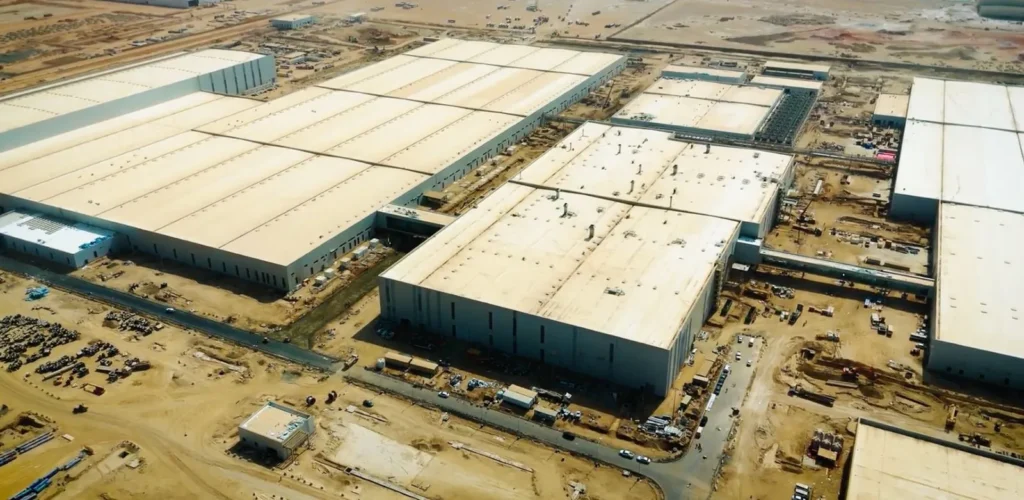 Aerial drone view tracking the industrial layout for a factory construction video of the CEER paint factory near Jeddah.