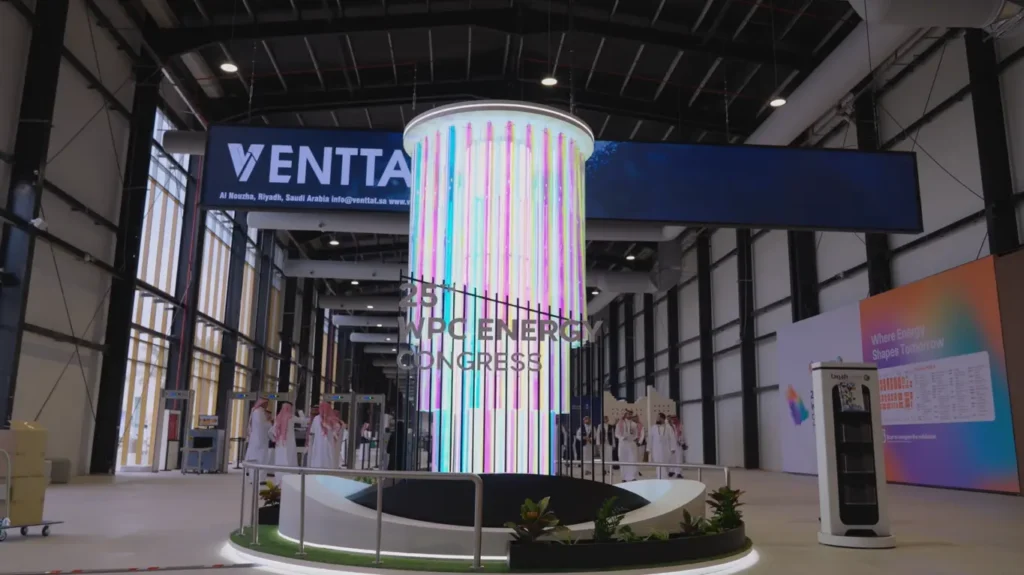 Illuminated 25th WPC Energy Congress installation inside the exhibition hall in Riyadh, Saudi Arabia.